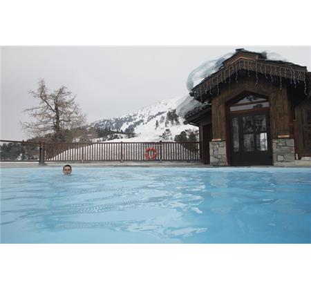 7003179_1119_hmc_arc_1950_le_village_arch-01hl2